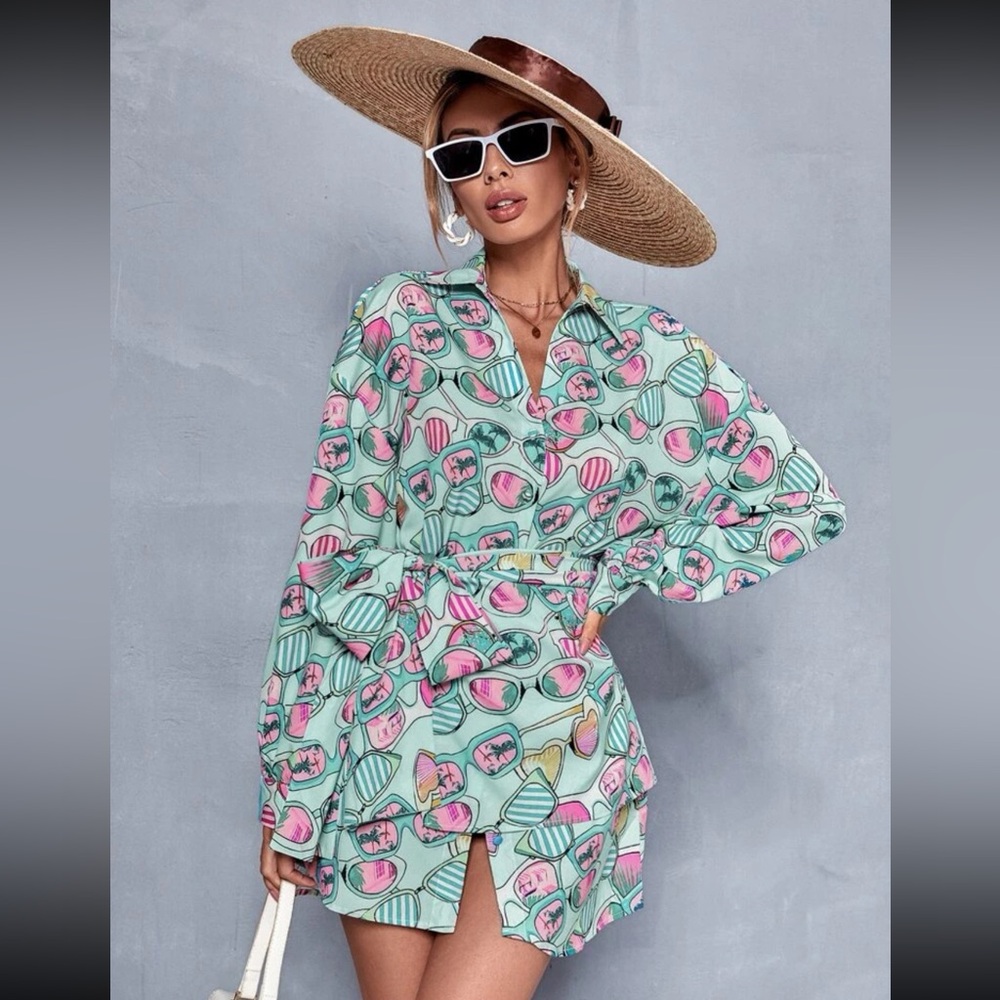 Medium dress, great for vacation!  Sunglass print, wrap dress!